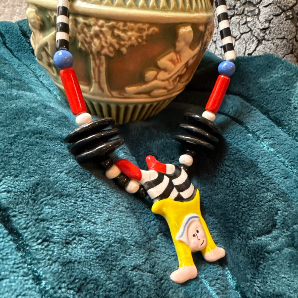 Ruby Z Candace Loheed ceramic flipping  boy pendant necklace ( Read)